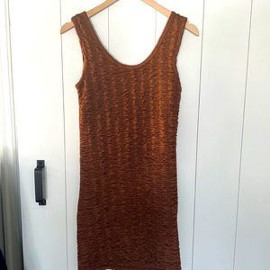 Brown coloured dinner kinda dress. Fully stretchable and very comfy to wear